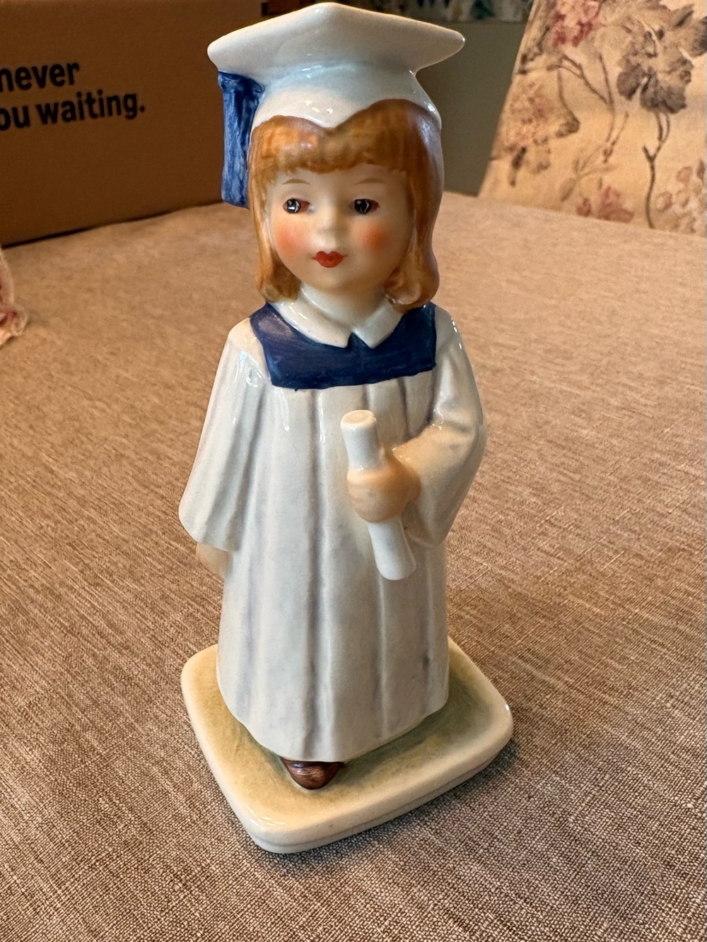 Goebel Porcelain Graduation Figurine in White and Blue with Blonde Hair